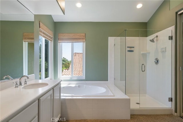 9320 Isaac Lord Dr, Rancho Cucamonga, CA 91701 - full bath featuring a bath, a stall shower, vanity, and recessed lighting