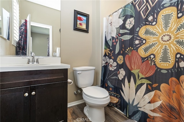 384 Ruby Red Ln, Upland, CA 91786 - bathroom with wood finished floors, vanity, and a shower with shower curtain