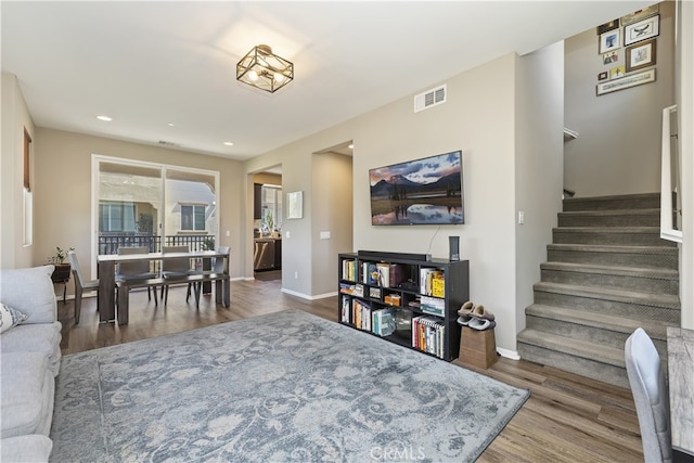384 Ruby Red Ln, Upland, CA 91786 - living room with wood finished floors, stairs, and recessed lighting
