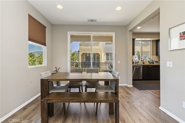 384 Ruby Red Ln, Upland, CA 91786 - dining area featuring light wood-style flooring and recessed lighting