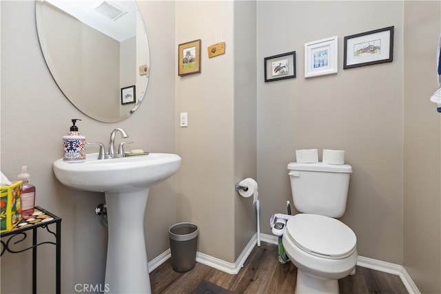 384 Ruby Red Ln, Upland, CA 91786 - bathroom with wood finished floors and toilet