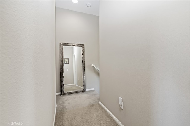 384 Ruby Red Ln, Upland, CA 91786 - corridor featuring carpet and an upstairs landing