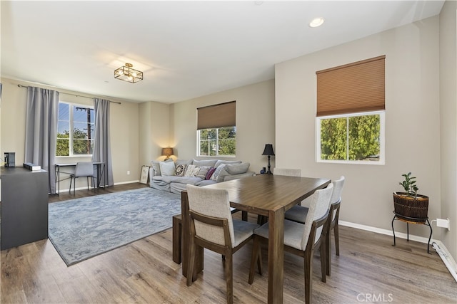 384 Ruby Red Ln, Upland, CA 91786 - dining area featuring wood finished floors and recessed lighting