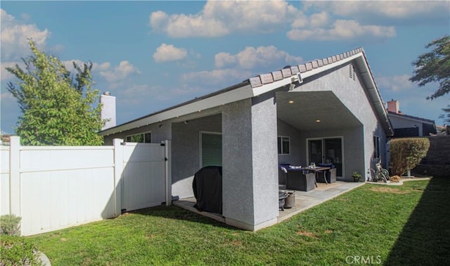 18224 Kalin Ranch Dr, Victorville, CA 92395 - back of property featuring a patio and stucco siding