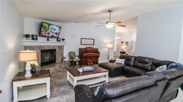 18224 Kalin Ranch Dr, Victorville, CA 92395 - living area featuring a ceiling fan, a fireplace, and concrete floors
