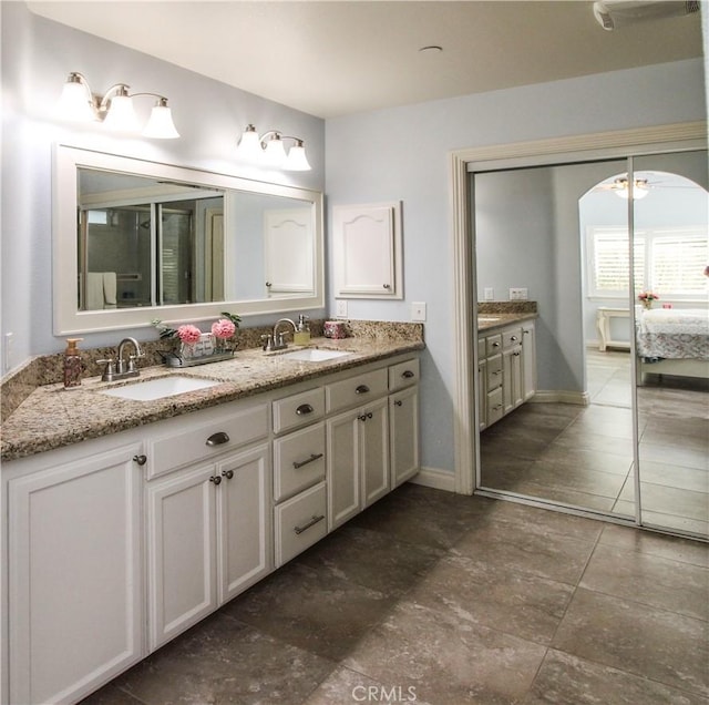 18224 Kalin Ranch Dr, Victorville, CA 92395 - bathroom featuring double vanity and tile patterned floors