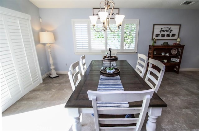 18224 Kalin Ranch Dr, Victorville, CA 92395 - dining area with a chandelier and baseboards