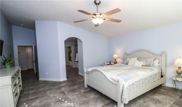 18224 Kalin Ranch Dr, Victorville, CA 92395 - bedroom featuring arched walkways and a ceiling fan