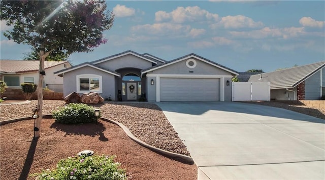18224 Kalin Ranch Dr, Victorville, CA 92395 - single story home with a garage, concrete driveway, and stucco siding