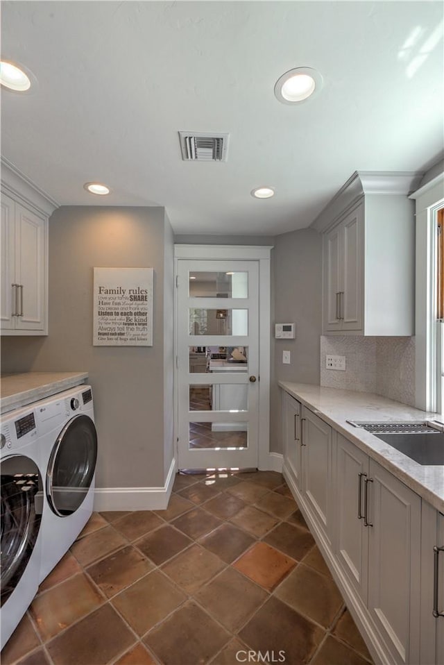 1205 W Highland, Redlands, CA 92373 - laundry room with cabinet space, washing machine and dryer, and recessed lighting