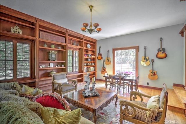 1205 W Highland, Redlands, CA 92373 - sitting room featuring wood finished floors and a chandelier