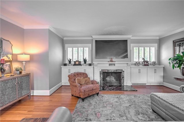 1205 W Highland, Redlands, CA 92373 - living room with wood finished floors, healthy amount of natural light, a premium fireplace, and crown molding