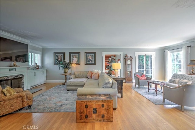 1205 W Highland, Redlands, CA 92373 - living room featuring wood finished floors, healthy amount of natural light, and ornamental molding