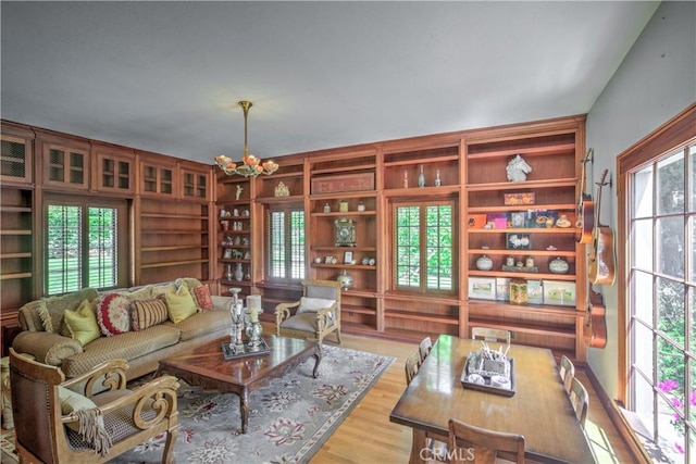1205 W Highland, Redlands, CA 92373 - living area featuring light wood-style floors and a chandelier