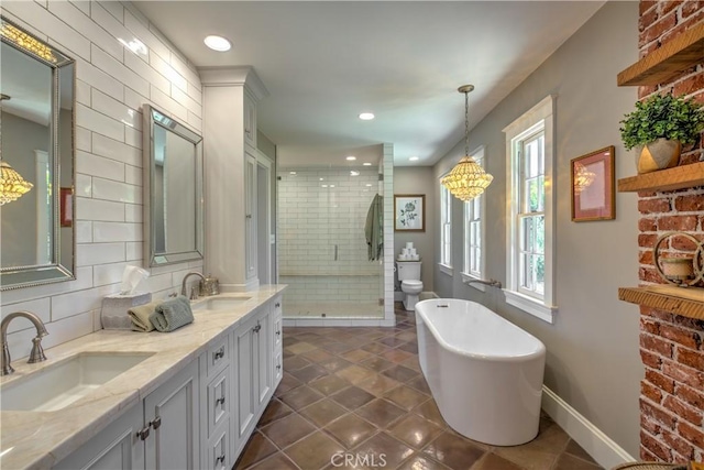 1205 W Highland, Redlands, CA 92373 - bathroom featuring a shower stall, double vanity, a freestanding tub, tile patterned flooring, and a chandelier