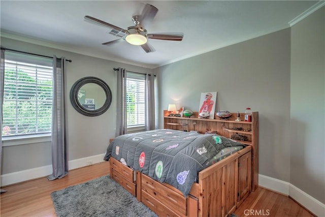 1205 W Highland, Redlands, CA 92373 - bedroom with crown molding, light wood-type flooring, and ceiling fan