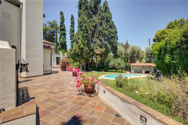 1205 W Highland, Redlands, CA 92373 - view of patio / terrace with an outdoor pool