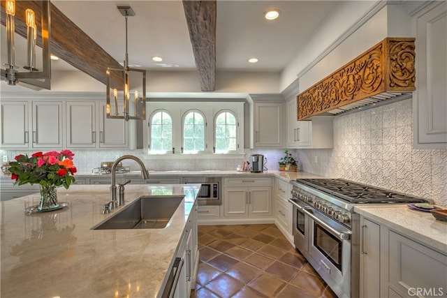 1205 W Highland, Redlands, CA 92373 - kitchen with appliances with stainless steel finishes, light stone countertops, backsplash, hanging light fixtures, and recessed lighting