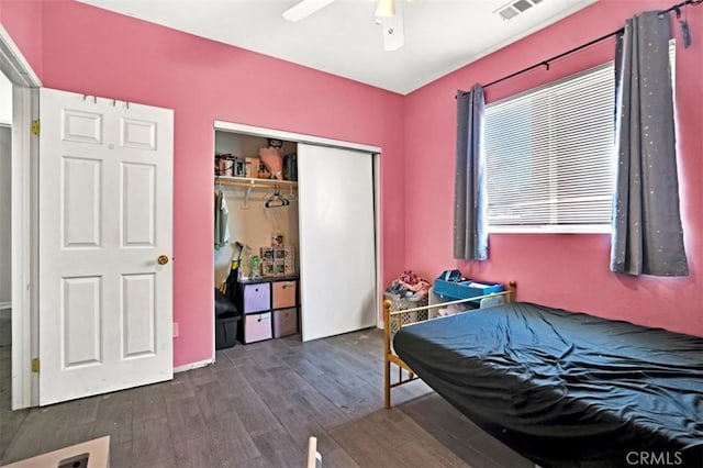 629 Ivy Crest Dr, San Jacinto, CA 92582 - bedroom featuring dark wood finished floors, a closet, and ceiling fan