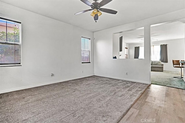 629 Ivy Crest Dr, San Jacinto, CA 92582 - carpeted spare room with ceiling fan, healthy amount of natural light, and wood finished floors