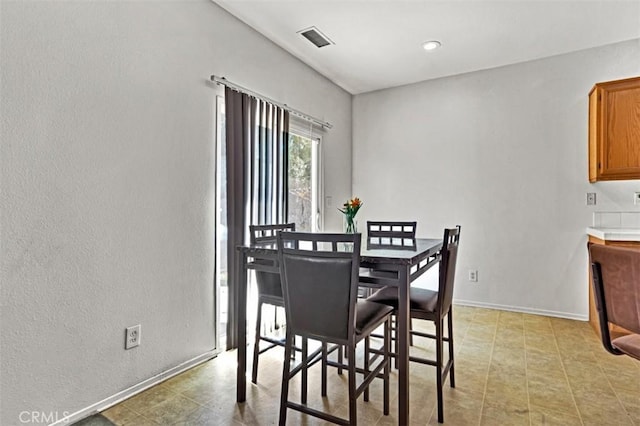 629 Ivy Crest Dr, San Jacinto, CA 92582 - dining room with a textured wall and light floors