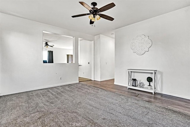 629 Ivy Crest Dr, San Jacinto, CA 92582 - unfurnished living room featuring ceiling fan and wood finished floors