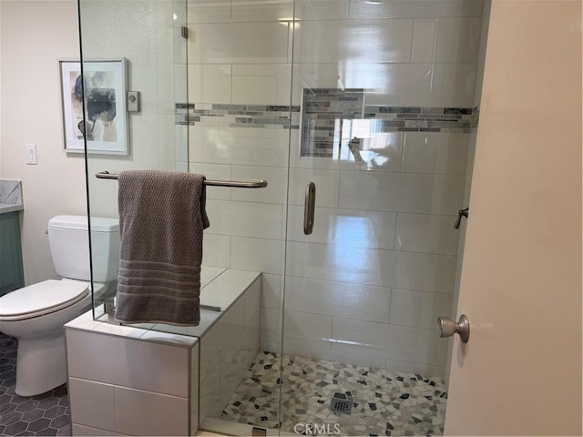 1540 Northwood Rd Unit 11-270L, Seal Beach, CA 90740 - bathroom featuring a shower stall, vanity, and tile patterned flooring