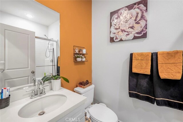 1633 Topeka Pl, Upland, CA 91784 - bathroom featuring a shower with shower door and vanity