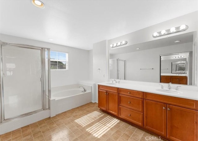 13837 Emerald Ln, Gardena, CA 90247 - full bathroom featuring a garden tub, double vanity, and a shower stall