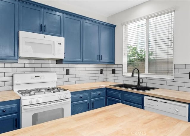 13837 Emerald Ln, Gardena, CA 90247 - kitchen with butcher block countertops, white appliances, blue cabinetry, and decorative backsplash