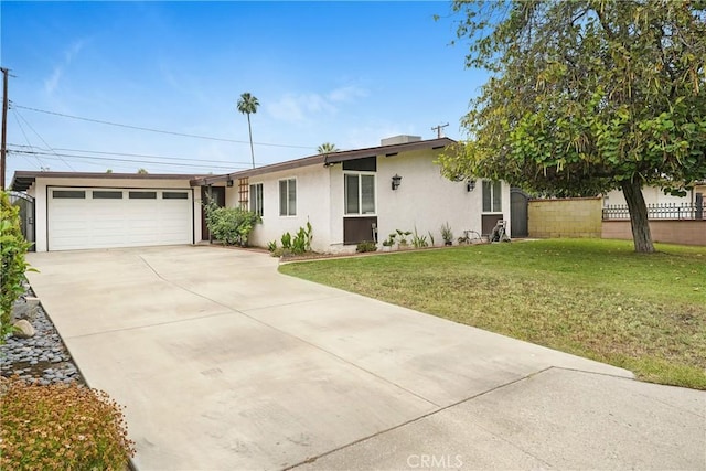 137 N Viceroy Ave, Azusa, CA 91702 - view of front of house featuring stucco siding, driveway, and an attached garage