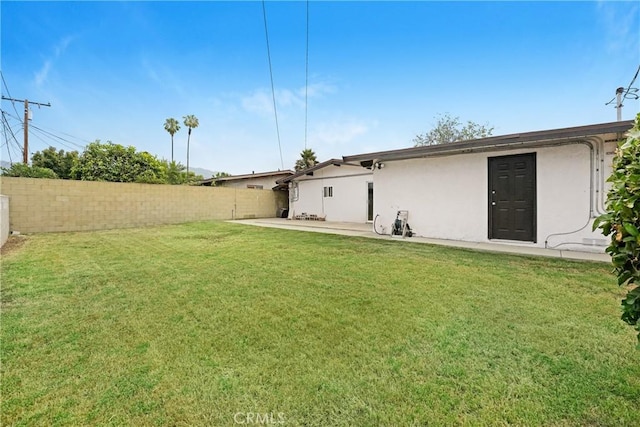 137 N Viceroy Ave, Azusa, CA 91702 - rear view of property with stucco siding and a patio