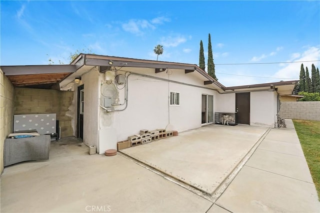 137 N Viceroy Ave, Azusa, CA 91702 - rear view of property with a patio area and stucco siding