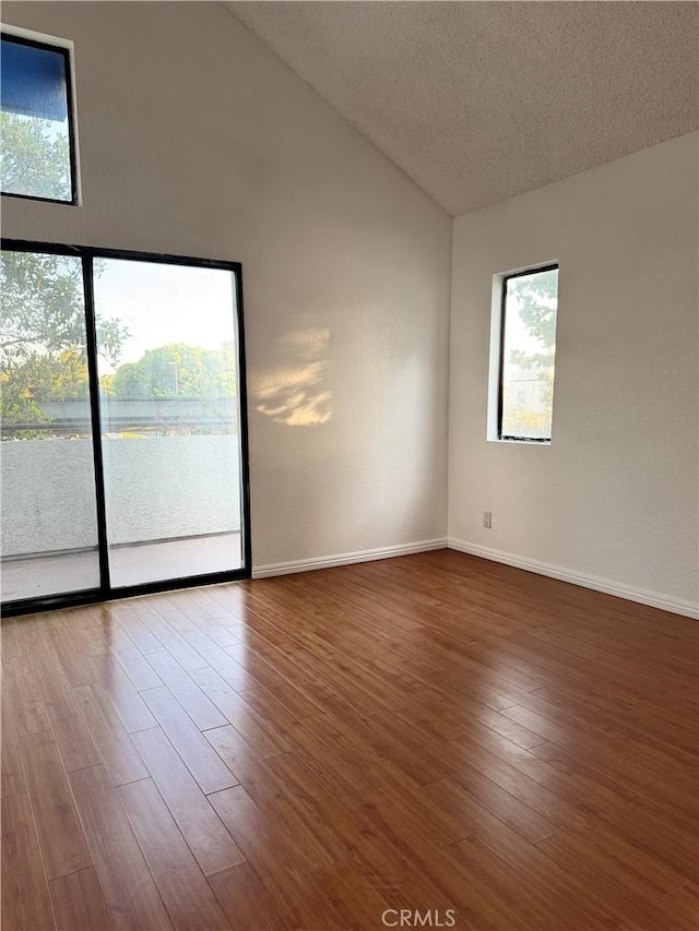 102 Park Shadow Ct, Baldwin Park, CA 91706 - spare room featuring vaulted ceiling and wood finished floors