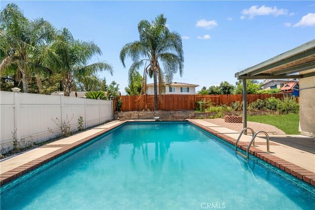 6910 Valinda Ave, Rancho Cucamonga, CA 91701 - view of swimming pool with a fenced backyard and a patio