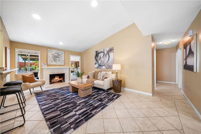 6910 Valinda Ave, Rancho Cucamonga, CA 91701 - living room with light tile patterned floors, a brick fireplace, and recessed lighting