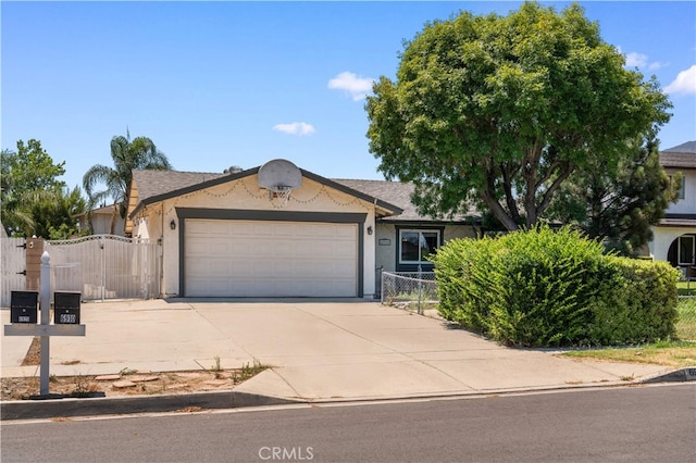 6910 Valinda Ave, Rancho Cucamonga, CA 91701 - ranch-style home featuring stucco siding, an attached garage, a gate, and concrete driveway