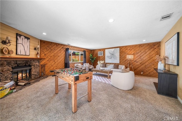 6910 Valinda Ave, Rancho Cucamonga, CA 91701 - living area with wooden walls, carpet flooring, a fireplace, and recessed lighting