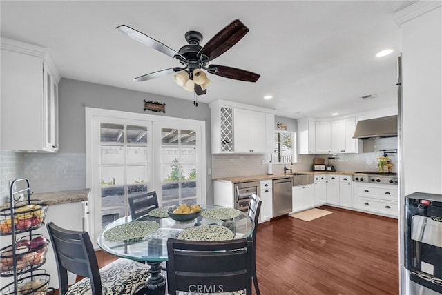2622 S Pacific Ave, Santa Ana, CA 92704 - dining space with a ceiling fan, recessed lighting, and dark wood-type flooring