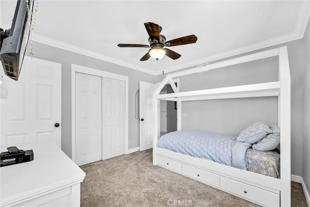 2622 S Pacific Ave, Santa Ana, CA 92704 - bedroom with ornamental molding, carpet, a closet, and a ceiling fan