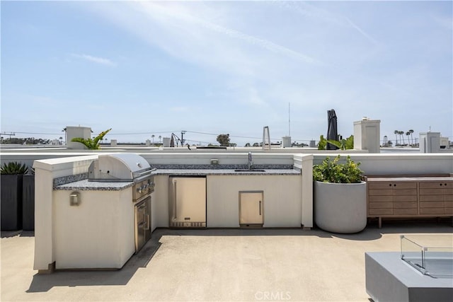 35 Ebb Tide Cir, Newport Beach, CA 92663 - view of patio featuring a sink and an outdoor kitchen