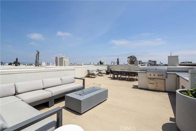 35 Ebb Tide Cir, Newport Beach, CA 92663 - view of patio featuring an outdoor living space with a fire pit, a skyline view, outdoor dining area, and area for grilling