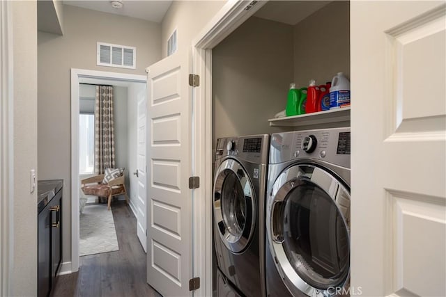 35 Ebb Tide Cir, Newport Beach, CA 92663 - laundry room featuring washer and clothes dryer and dark wood finished floors