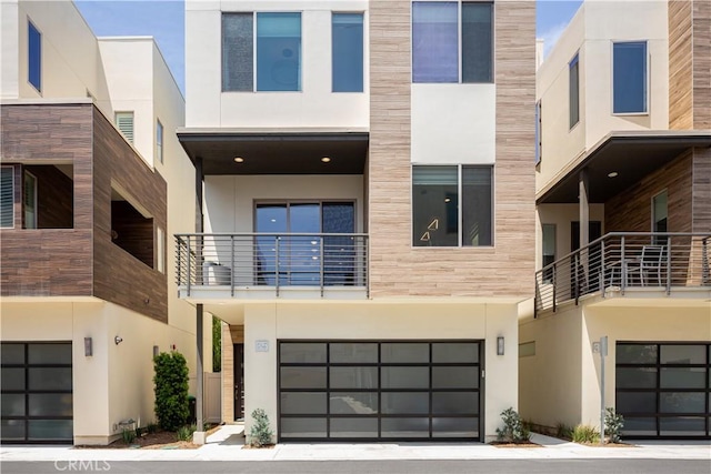 35 Ebb Tide Cir, Newport Beach, CA 92663 - view of building exterior with an attached garage