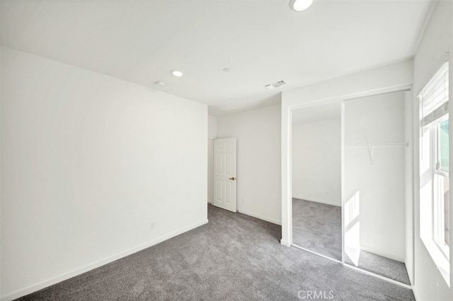 41207 Alegria Ln, Lake Elsinore, CA 92532 - unfurnished bedroom featuring carpet, a closet, and recessed lighting