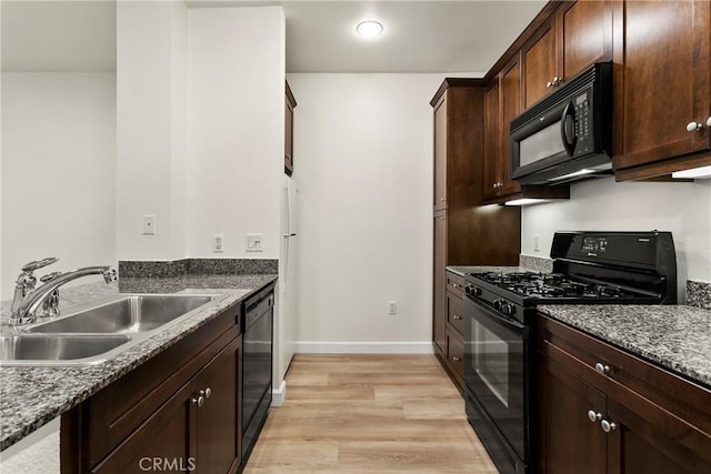 1106 Scholarship, Irvine, CA 92612 - kitchen featuring black appliances, light wood-style flooring, and dark brown cabinetry