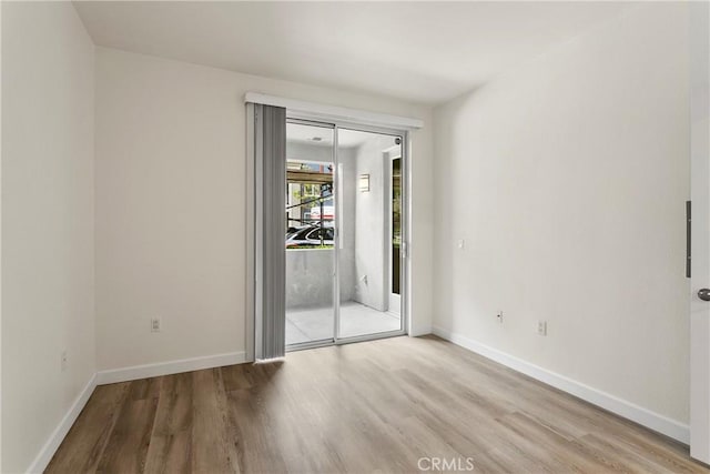 1106 Scholarship, Irvine, CA 92612 - unfurnished room with wood finished floors and baseboards