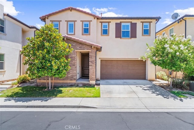 2825 Villa Catalonia Ct, Corona, CA 92881 - mediterranean / spanish home with a tile roof, an attached garage, stucco siding, driveway, and brick siding