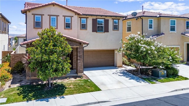 2825 Villa Catalonia Ct, Corona, CA 92881 - mediterranean / spanish-style home featuring an attached garage, a tile roof, stucco siding, and driveway
