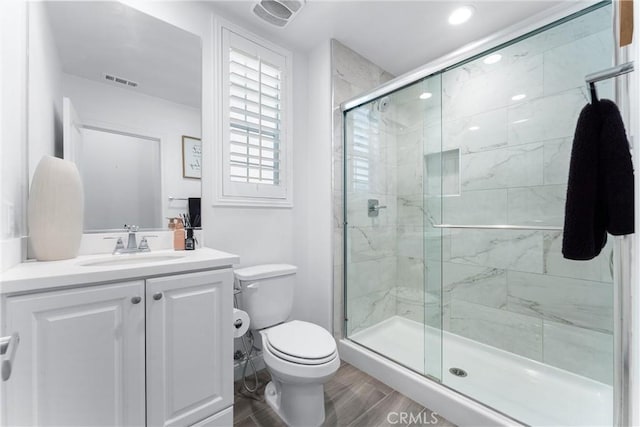 2825 Villa Catalonia Ct, Corona, CA 92881 - full bathroom featuring wood finished floors, a shower stall, and vanity